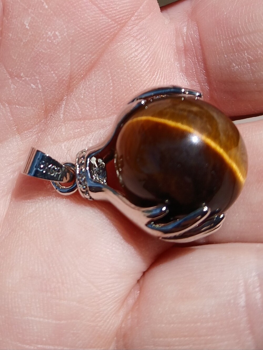 New 18K Hands Holding Tiger Eye Sphere Pendant.